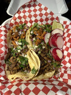 2 chicken tacos and 2 beef tacos