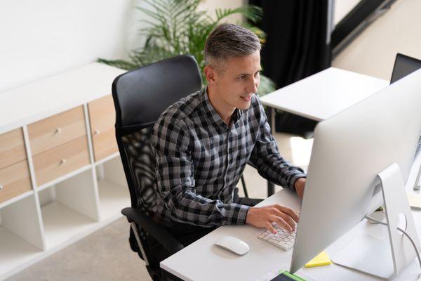 Technician working at a clean, modern workstation