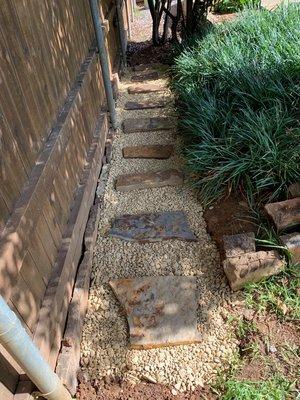Flagstone Walkway on River-rock over a French drain Extension