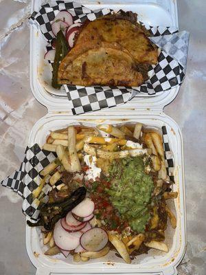 Birria Nacho Fries and two birria tacos.