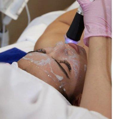 OxyGeneo Facials. It's a 3 in 1 facial that uses exfoliation , ultrasound penetration, and massage. Result driven facial.