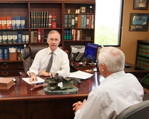 Personal injury attorney James Cunningham with a client.