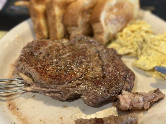 Steak and eggs with toast