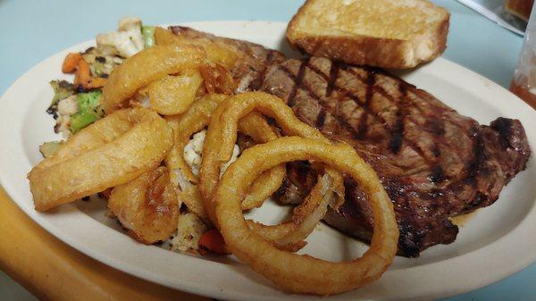 Ribeye with onion rings