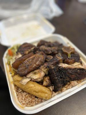 Oxtails and jerk chicken.