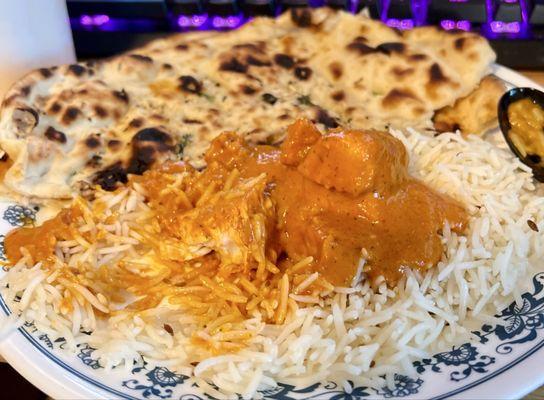 chicken tikka masala partially eaten (1/4th serving of it)