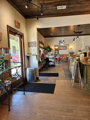 A glance into the other seating area and front of the shop.
