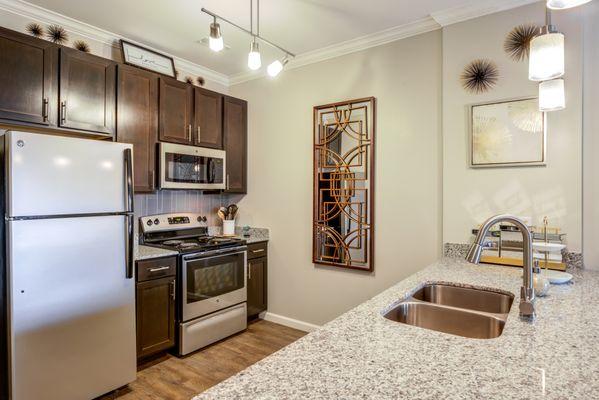 Upgrades galore! Stainless appliances, granite countertops, custom cabinetry