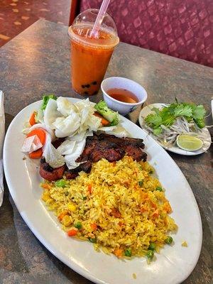 Pork bbq with fried rice & thai tea.