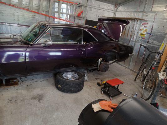 Grape - Ape getting new air shocks.
67' Firebird