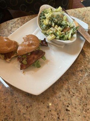 Chicken club sandwich and Cesar salad
