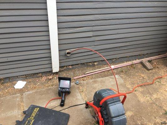 Doing a sewer camera inspection on a home before the home buyer closes on the deal.