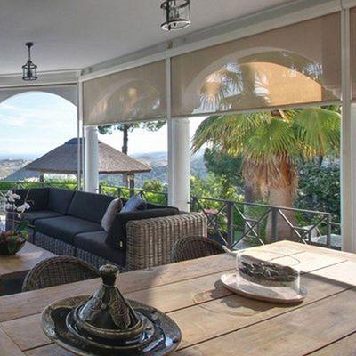 We offer solar shades with optional motorization for your lanai.