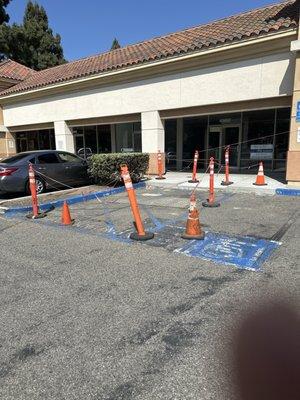 Disability parking space. It has been inaccessible for more than 5 months.