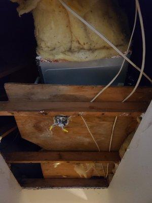 The hole in my ceiling that is only there because of this botched install.