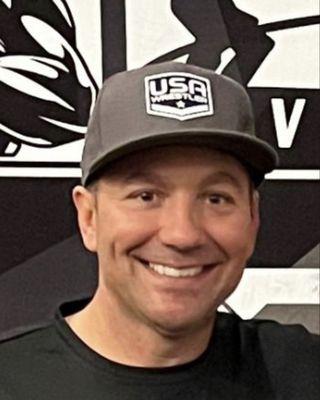 Photo of Coach D.