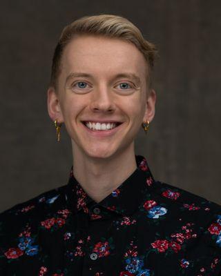 Photo of Dustin J.