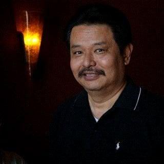 Photo of James K.