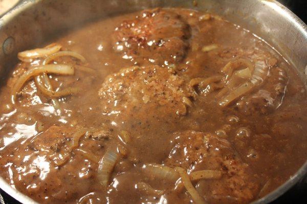 Hamburger steak with onions and mushroom gravy on there catering menu