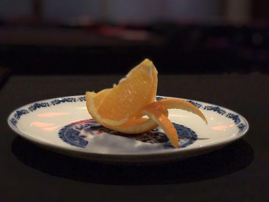 The cutest fruit presentation; Orange cut up into a lobster