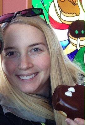 Showing off my beautiful teeth. They still look good even after a chocolate doughnut