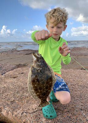 His first flounder! Caught on live shrimp from Rodbenders.