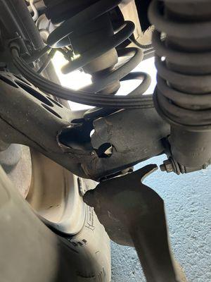 The wheelchair ramp reinforcement of our van had broken off of the axle assembly.