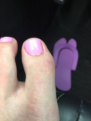 Not straight. And terrible polish application.