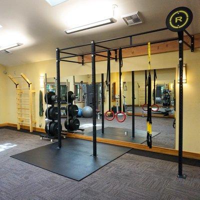 Stall bars, squat rack, wall ball shots, TRX, gymnastic rings and pull-ups galore.