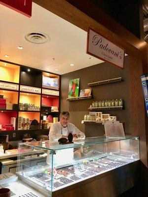 Look for the "Padovani's Chocolate sign! It's near the Kuhio Ave entrance.