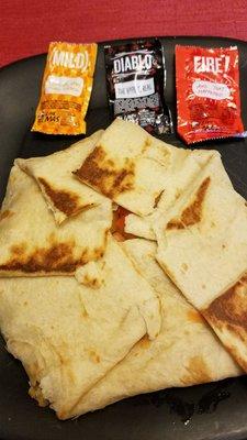 Crunch wrap supreme with choice of added sauces.