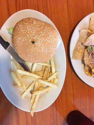 His burger and "side" of fries.