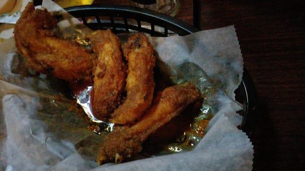 Hot wings swimming in grease