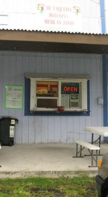 The ordering window with menu and business hours.