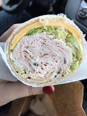 Turkey cheese & lettuce on a whole wheat wrap