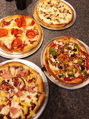 Maui Wowwi, Pepperoni, Chicken Carbonara and High Five (clockwise)