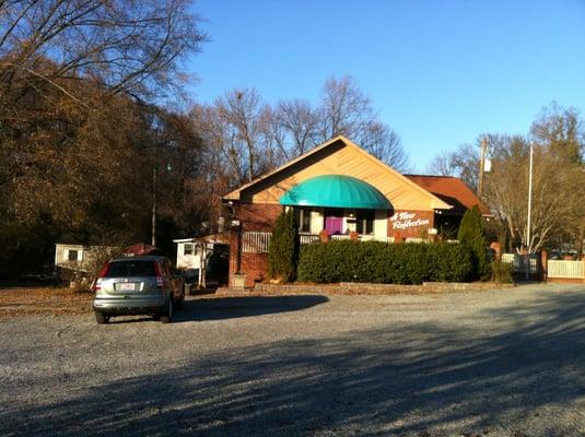 Located in the lower level of A New Reflection salon.