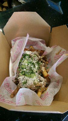 Eponymous disco fries in to go container