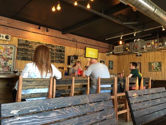 Easy going small bar with nice custom wood chairs and bartenders that know their beer.