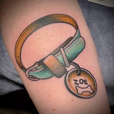Tattoo of my dog's collar and tag.