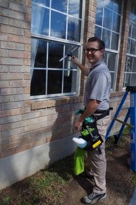 Josh cleaning windows