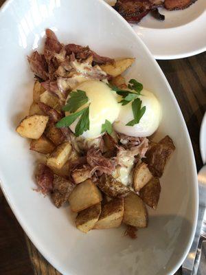 Renewal breakfast menu includes this phenomenal item: duck confit, poached eggs and hash browns. Fantastic