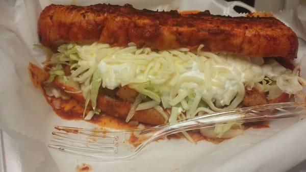 Pambozos (traditional Mexican white bread dipped in a red guajillo sauce and filled with potatoes with chorizo).  Amazingly good!