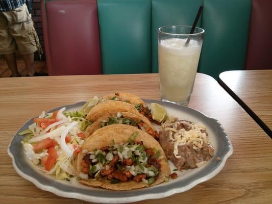 Tacos al pastor and salad.