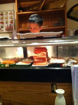 $1 sushi mon thru thurs.  Promising.