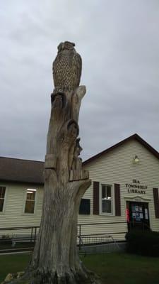 Our storm-damaged 100+ yr. old tree was painstakingly carved it into the next generation of usefulness.