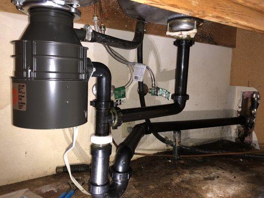 New garbage disposal and drain pipe replacement in Redlands.
