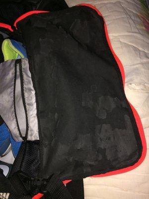 Old bag. Liner delaminating.