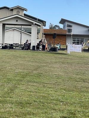 band warming up under the gazebo...