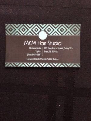 Business card for one of the stylists, Melissa Girba.